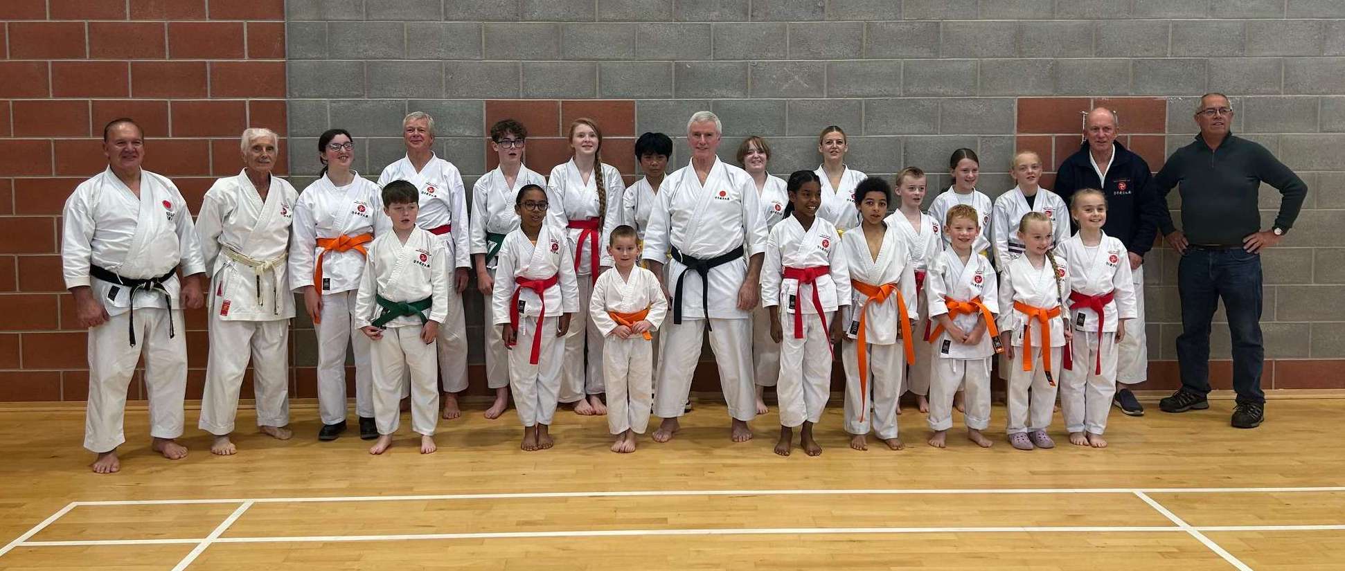 Group photo of karateka wearing their new belts after the grading with Sensei Jim Brennan on the eleventh of October, 2025.