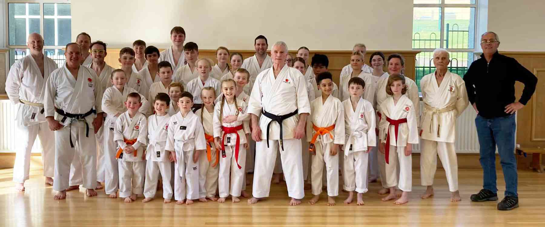 Group photo of karateka wearing their new belts after the grading with Sensei Jim Brennan on the twenty-eighth of February, 2026.